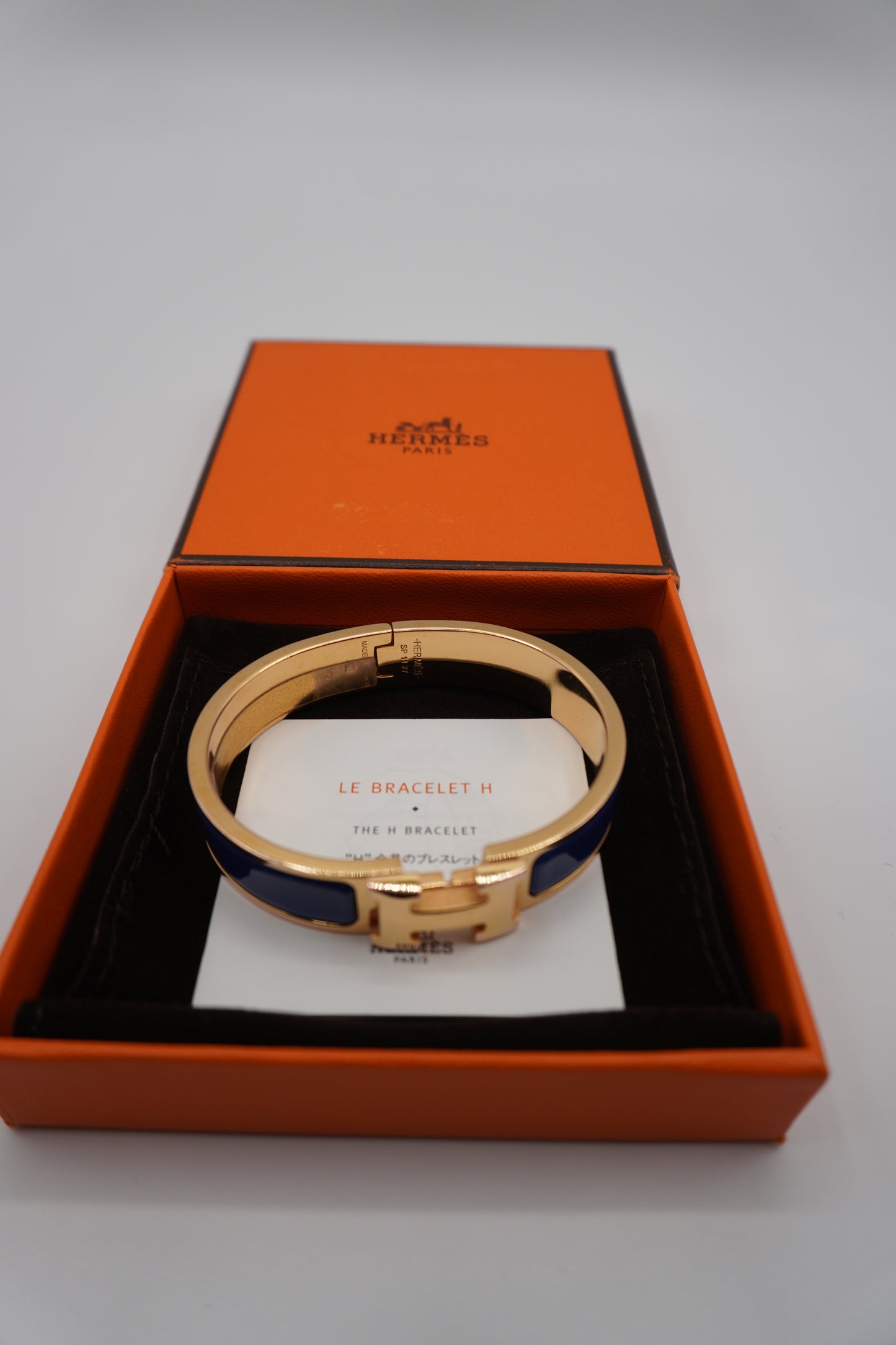Hermès Clic H Bracelet in Gold & Blue Enamel