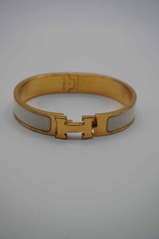 Hermès Clic H Bracelet in Gold & White Enamel