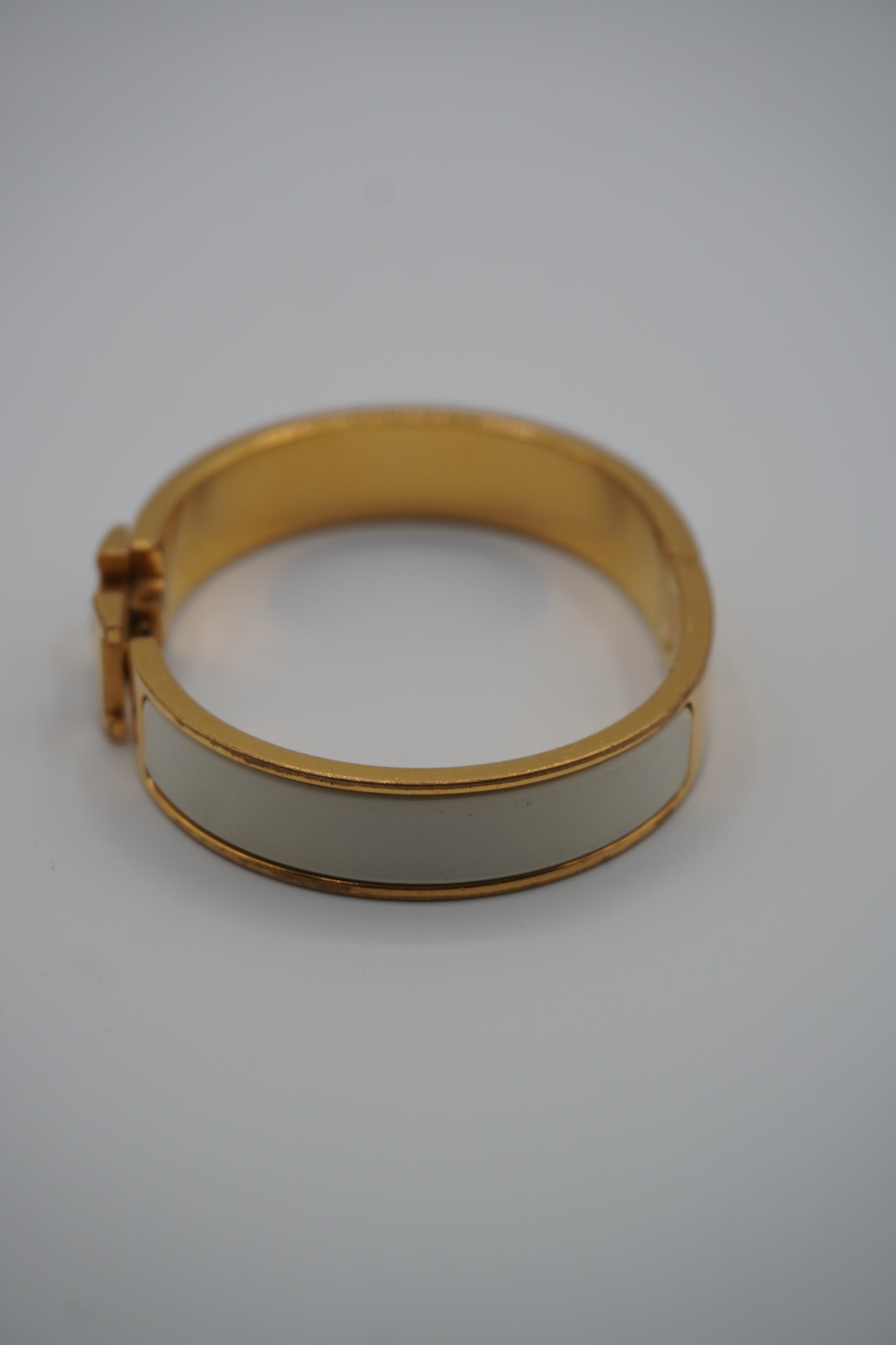 Hermès Clic H Bracelet in Gold & White Enamel