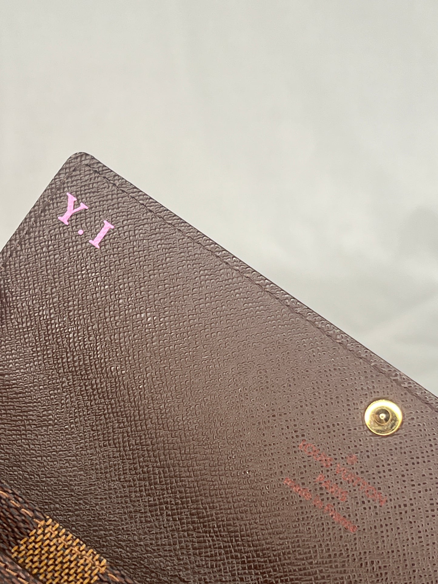 Louis Vuitton Sarah Wallet in Damier Ebene Canvas