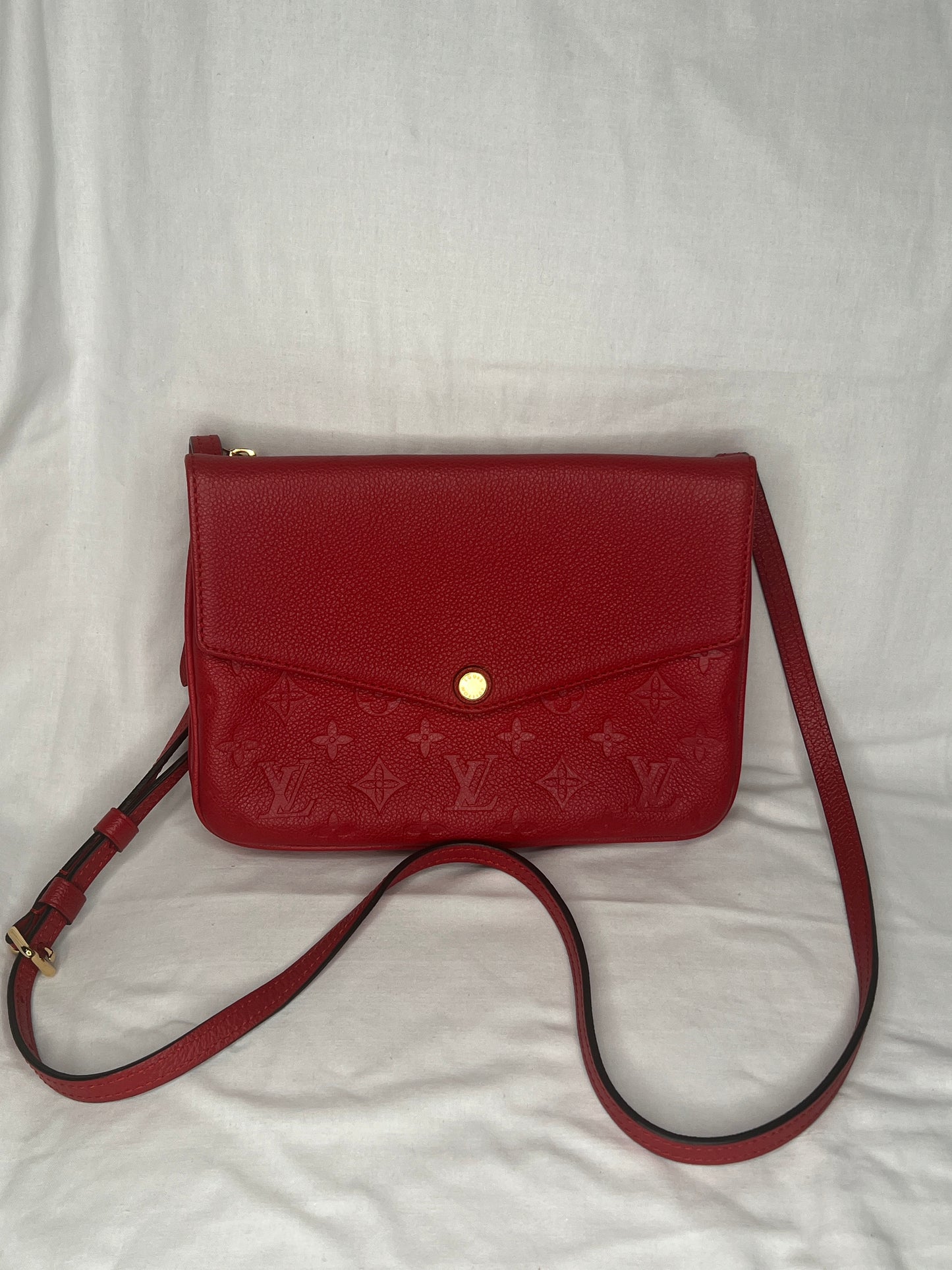 Louis Vuitton Monogram Empreinte Twice Crossbody Bag in Red Leather