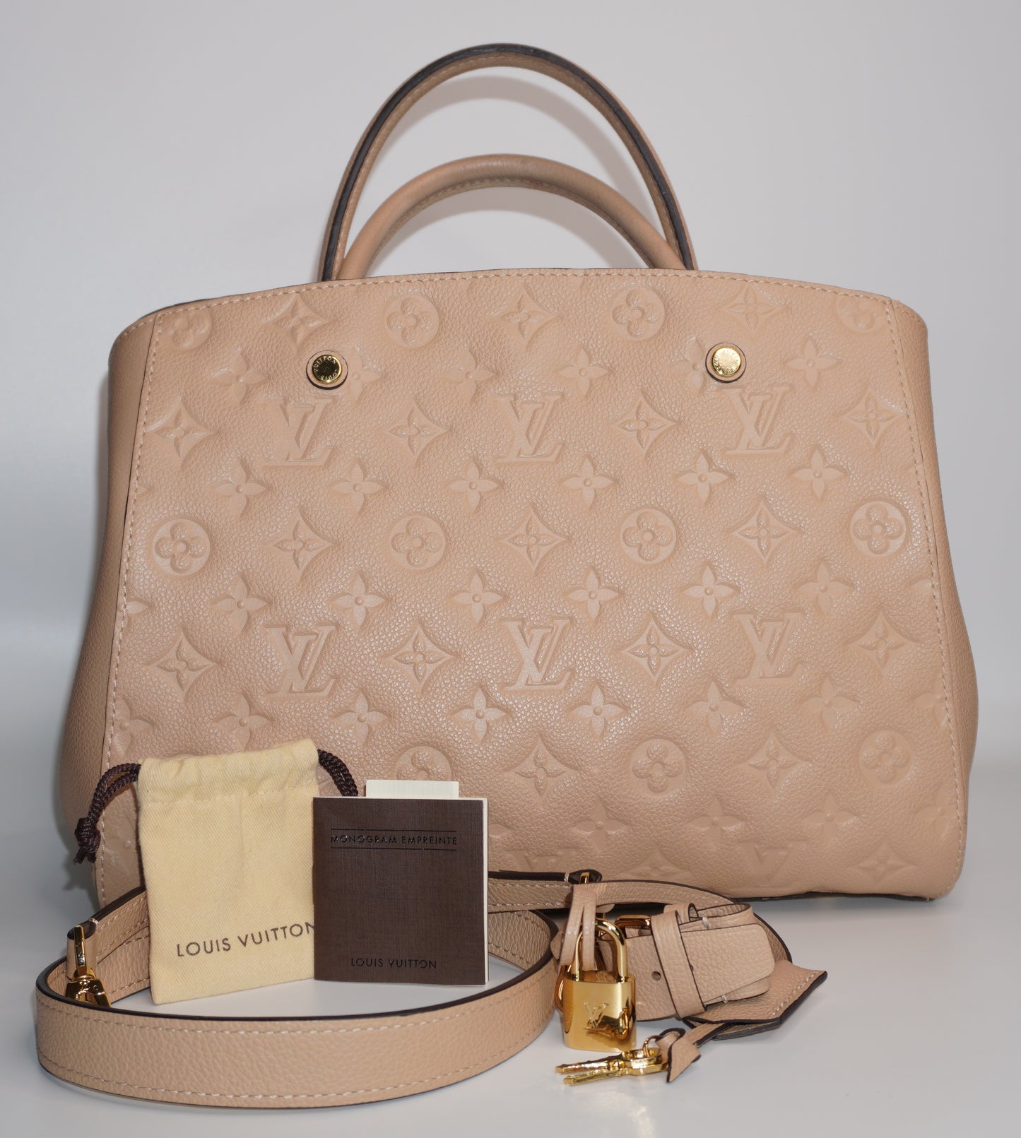 Louis Vuitton Montaigne MM in Dune Monogram Empreinte Leather