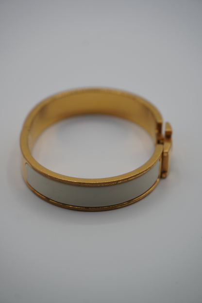 Hermès Clic H Bracelet in Gold & White Enamel