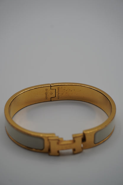 Hermès Clic H Bracelet in Gold & White Enamel