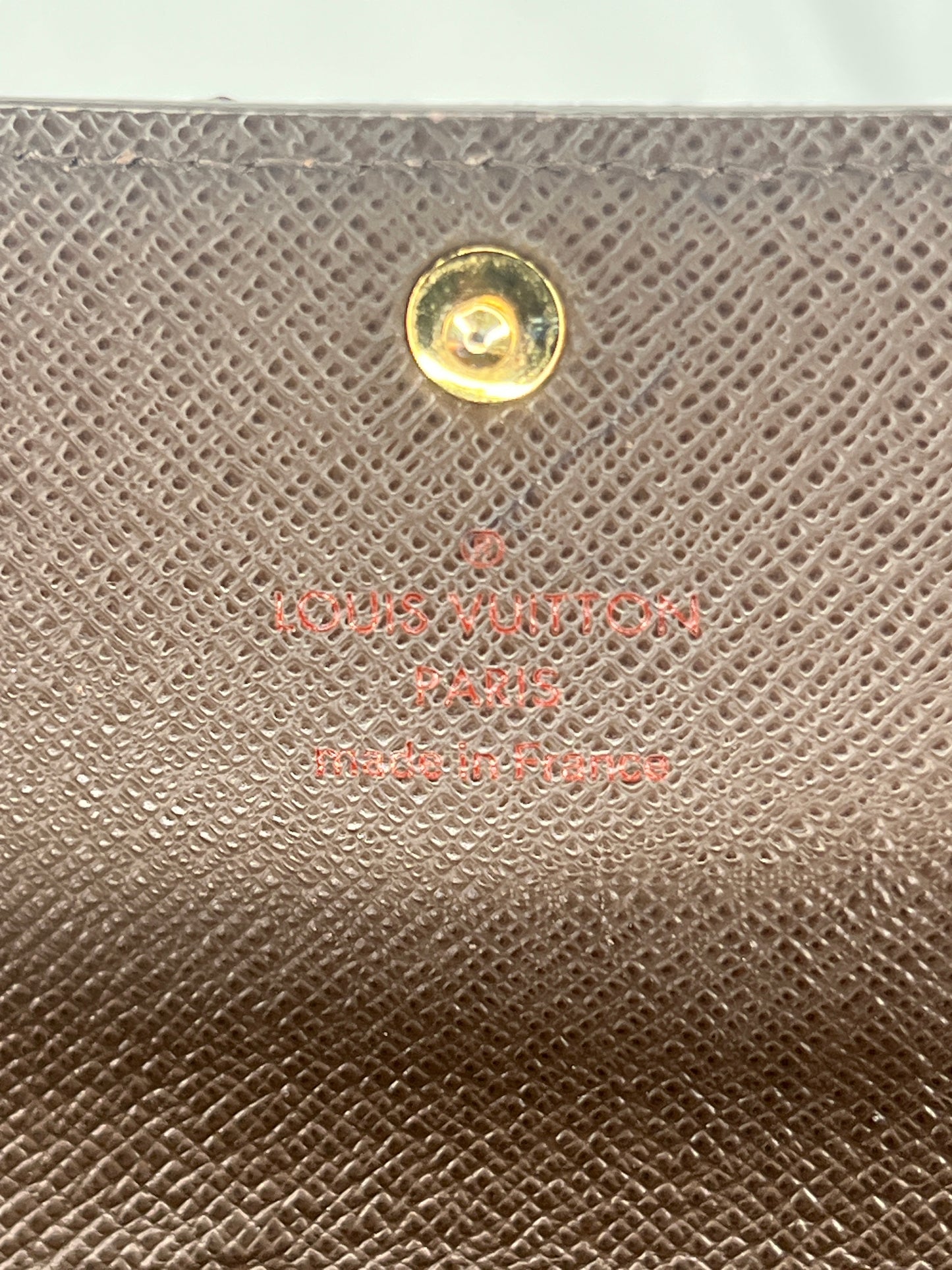 Louis Vuitton Sarah Wallet in Damier Ebene Canvas