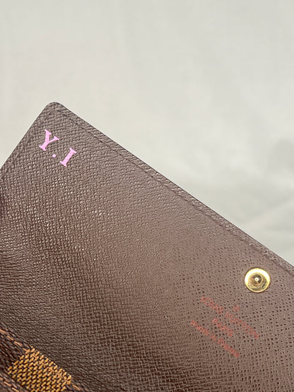 Louis Vuitton Sarah Wallet in Damier Ebene Canvas
