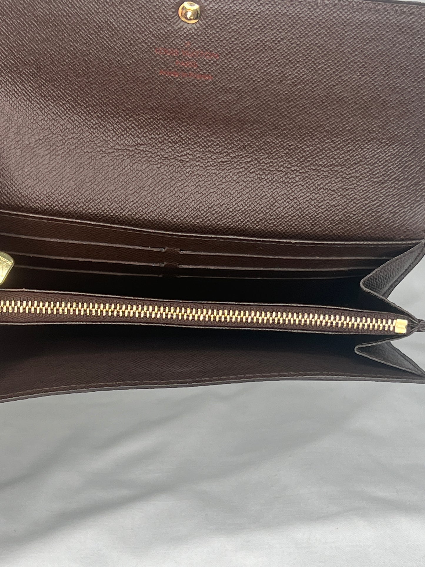 Louis Vuitton Sarah Wallet in Damier Ebene Canvas